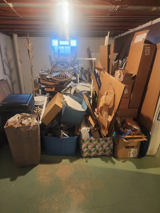 Roll-off dumpster container at job site for 2 Yard Dumpster Rental in St. Johns